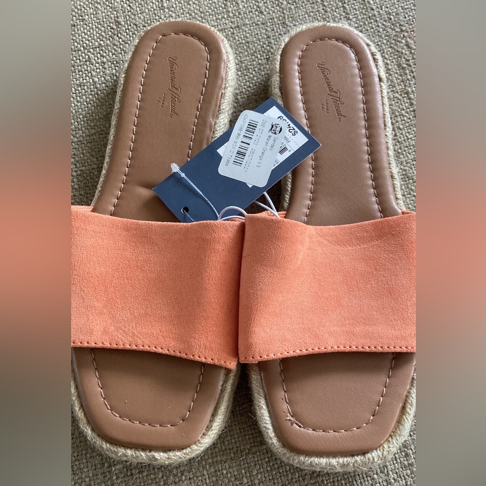 Peach colored sandals made by universal threads